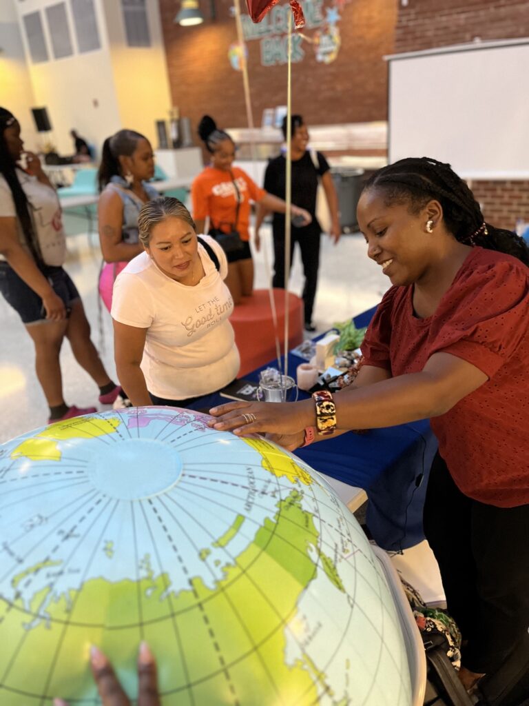 Coolidge family members engage with pillars of the Redesign model at the 2023 Back to School Night (photo courtesy of Kira Rowe)